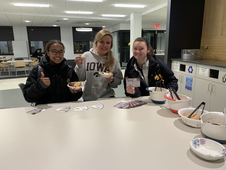 Student-athletes sample new foods at a Hawk Fuel Stop in Gerdin Athletic Learning Center.