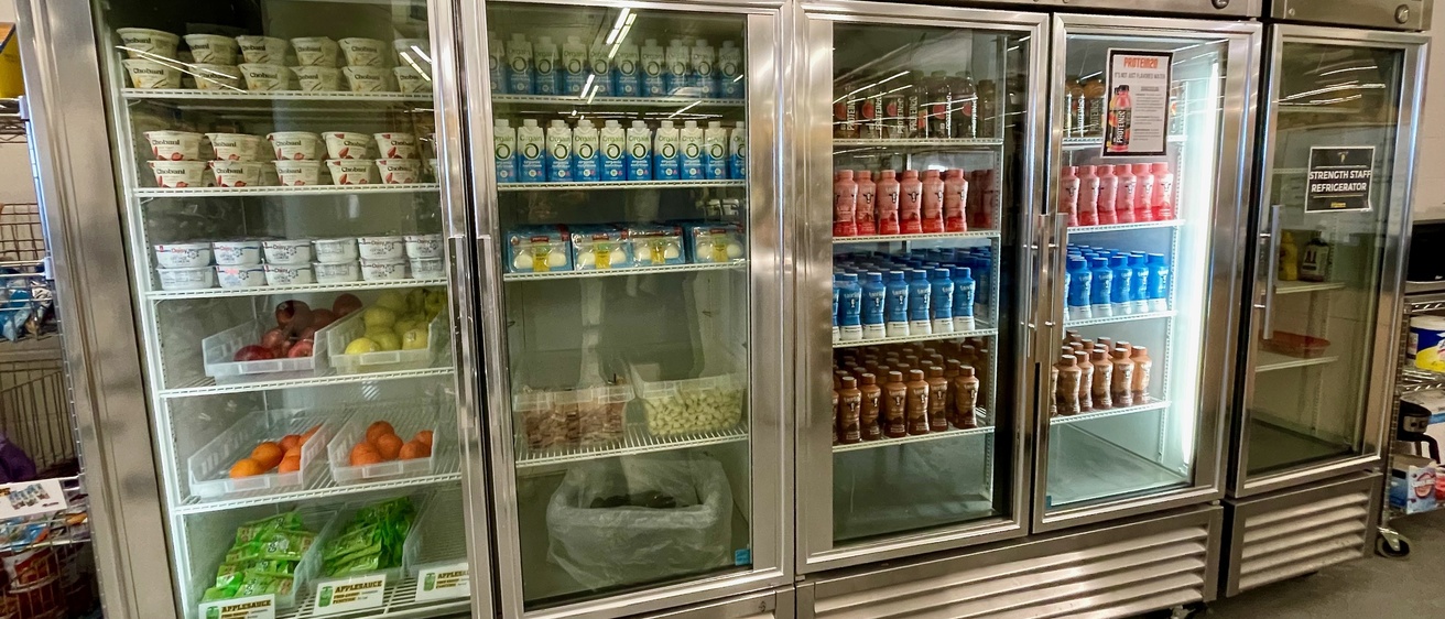 Snacks and shakes in coolers.